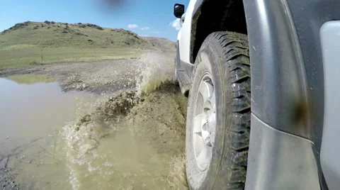Camera gets dirty while riding on a muddy road Stock Footage 62494177