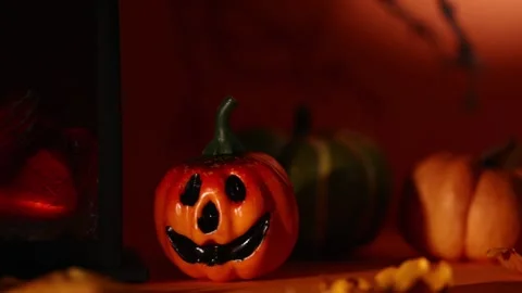 Camera Glide Across Lantern Fireplace, Pumpkin and Autumn Leaves Stock Footage 342377911