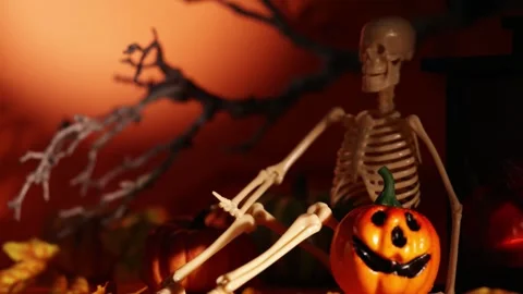 Camera Glide From Skeleton Decor to Glowing Lantern Fireplace Stock Footage 342377929