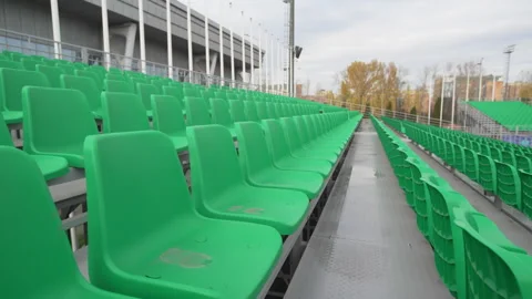 Camera glides smoothly along rows of bright wet seats Stockbeeldmateriaal 316755915