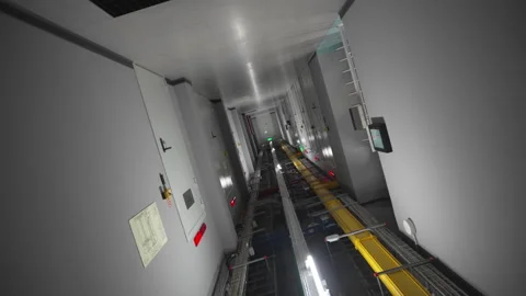 Camera glides smoothly through corridor of power station Stock Footage 309760780
