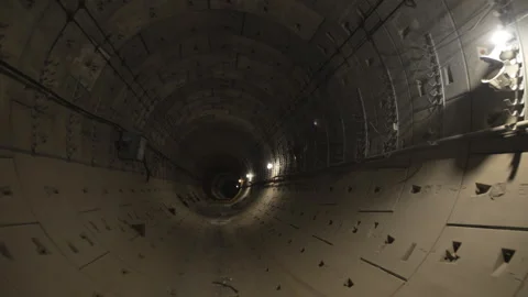 Camera glides smoothly through endless circular tunnel Video stock 316098523