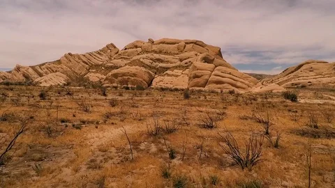 Camera glides toward rock formation Stock-Footage 74985172