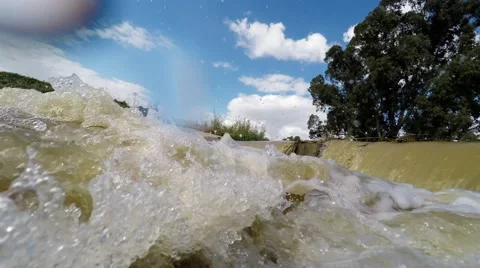 Camera goes down slowly into rushing water 스톡 동영상 47179280