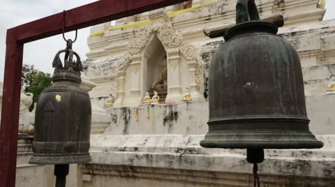 Camera goes through buddhist bells Stock Footage 62648476