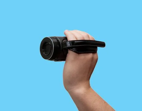 Camera in hand, a man Stock Photos