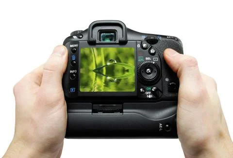 Camera in hand Stock Photos