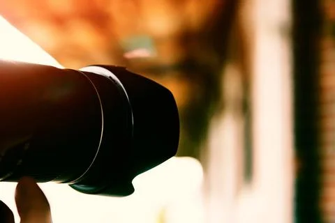 The camera is in the hands of the photographer. Stock-Fotos