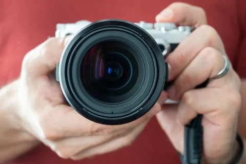 Camera held by a man Stock Photos