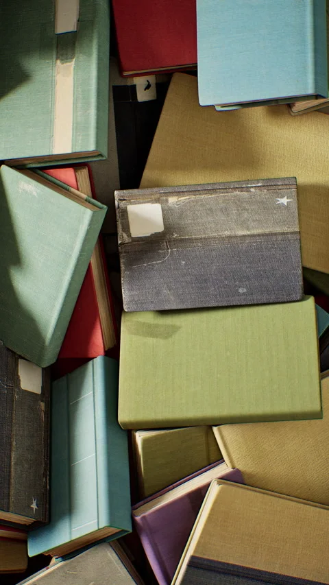 Camera High angle Rotation stack of books. Video stock 336718580