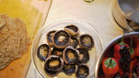 Camera hovering over Grilled Red Pepper, Potatoes in Aluminium Foil, Mushrooms Stock Footage 150132153