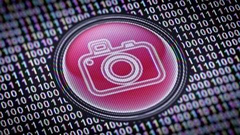 Camera icon. Binary code ( array of bits ) in the screen. Looping footage Video stock 110764821