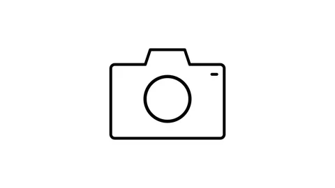 Camera icon displayed on a solid black background. 스톡 동영상 332986303