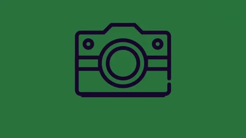 A camera icon on green background and isolated on green screen background Vídeos de archivo 337035456
