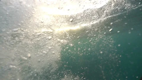 The camera is immersed under the water and over the sea in the drowning sea.  Stock Footage 185973517
