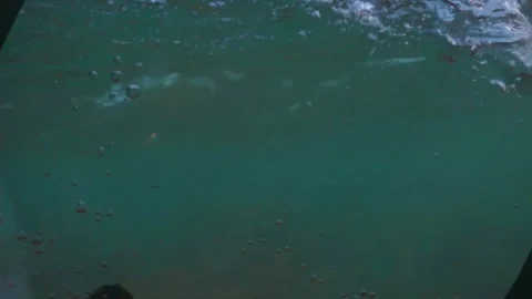 The camera is immersed under the water and over the sea in the drowning sea.  Stock Footage 203965959