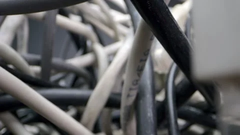 The camera immerses itself in the thicket of network cables and other eleme.. Video stock 246929952