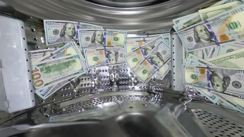 Camera inside the rotating drum of the washing machine. Paper American dollar Stock Footage 158327798