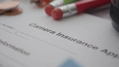 Camera insurance application process in detail Stock Footage 337690778