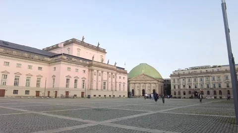 Camera jib at Historic Bebelplatz Square cobblestone plaza, opera house and Stock Footage 346008912