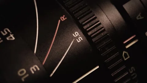 Camera lens aperture and focus ring adjusting the photoshoot Stock Footage 321148750