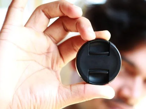 Camera lens cap front Stock Photos