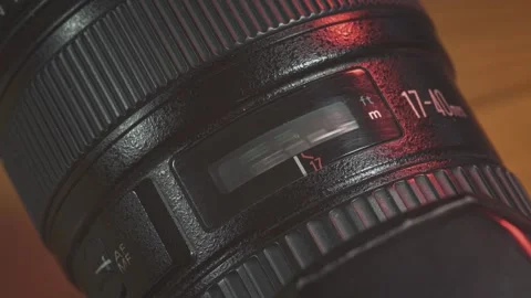 Camera lens changing focus from infinity to close up Stock Footage 295183514