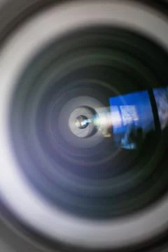 Camera lens close up with reflections. Stock Photos