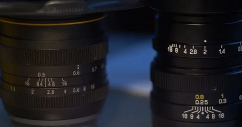 The camera lens on a dark background Stock Footage 85516308
