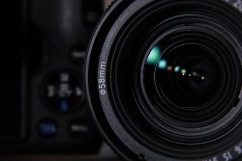 Camera Lens On Dark Background Stock Photos