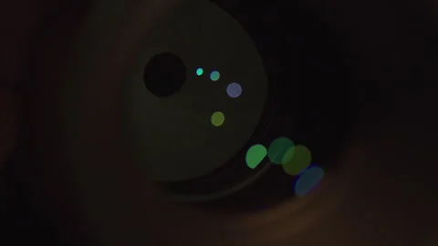 Camera lens iris aperture opens slowly Stock Footage 245302341