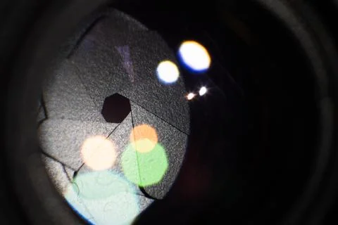 Camera lens with lense reflections. Macro concepts. Stock Photos