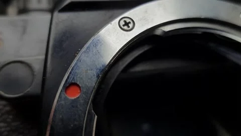 Camera Lens Mount with Red Alignment Dot in Macro Shot Stock Footage 310143022