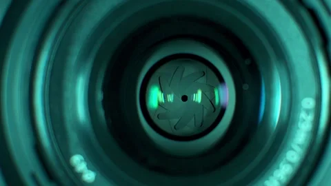 Camera Lens Pans to Viewer and Iris Opens Stock Footage 248167907