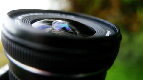 Camera Lens Reflecting Sky Stock-Footage 57912169