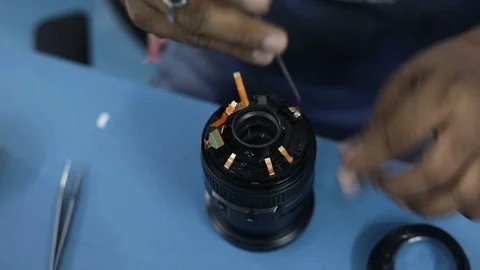 Camera lens repair Stock Footage 122661403