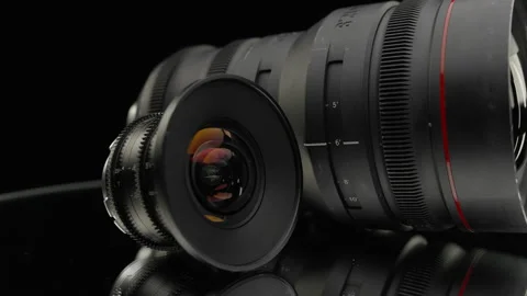 Camera Lens Size Comparison On Black Surface Video stock 335018668