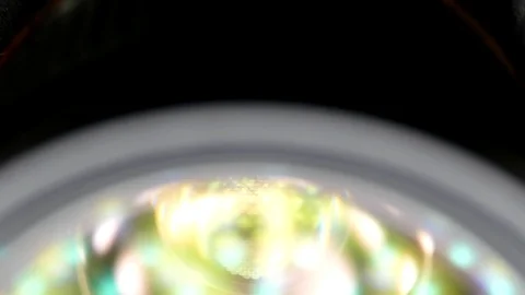 Camera lens tilt in light glare close up Stock Footage 87624610