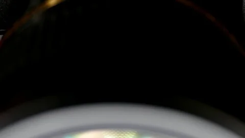 Camera lens tilt in light glare close up Stock Footage 87624631