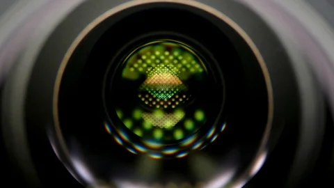 Camera lens tilt in light glare close up Stock Footage 87624778