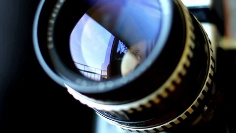 Camera Lens Zoom And Aperture Rings Rotating And Moving on Tripod Stock Footage 70646532