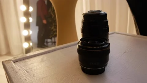 Camera lenses passes the photographer reflection in the mirror Stock Footage 146466343