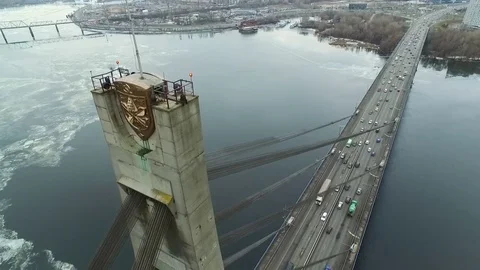 The camera at a level of the top of the bridge looking down. Aerial view Stock-Footage 70852485