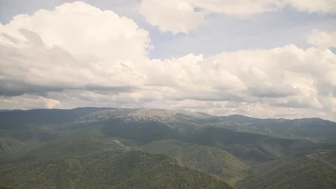 The camera in a light-engine plane flies in the mountains. Stock-Footage 119995671