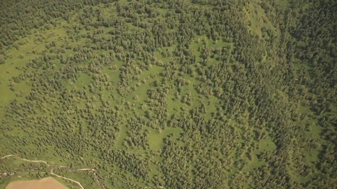 The camera in a light-engine plane flies in the mountains. Video stock 119995676