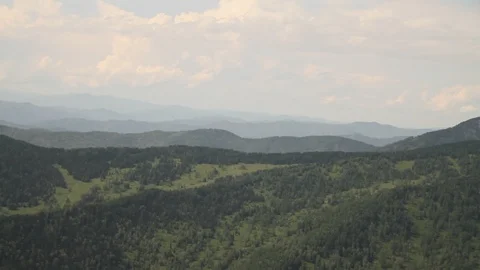 The camera in a light-engine plane flies in the mountains. Stock-Footage 119995737