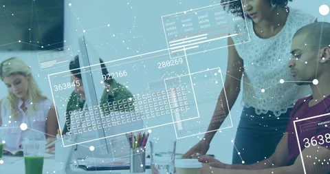 Camera lingering sparking business data overlays, colleague tracing charts, team Stock Footage 312655542