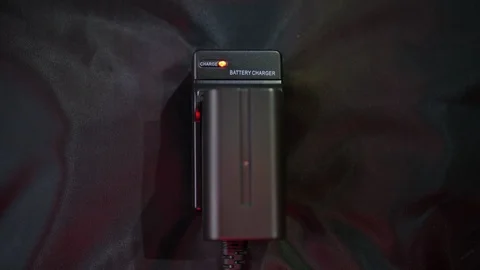 Camera Lithium Li-ion Battery Charging NP-F750 F770 7.4V 5000mAH Stock Footage 119166077