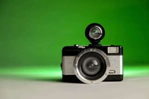 Camera lomo on infinite background and green lighting. Lomo concept. lomograp Stock Photos