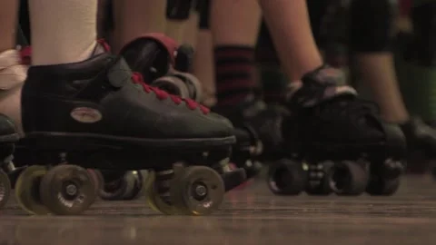 Camera long-lens of skaters lined up, Texas Roller Derby Video stock 232957898